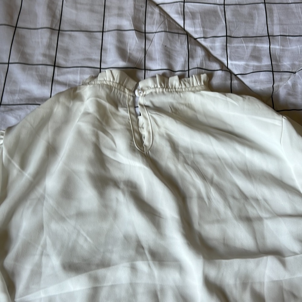 This beautiful shirt was to small for me around my arms. Very minimalist vibe. - Picture 3 of 4